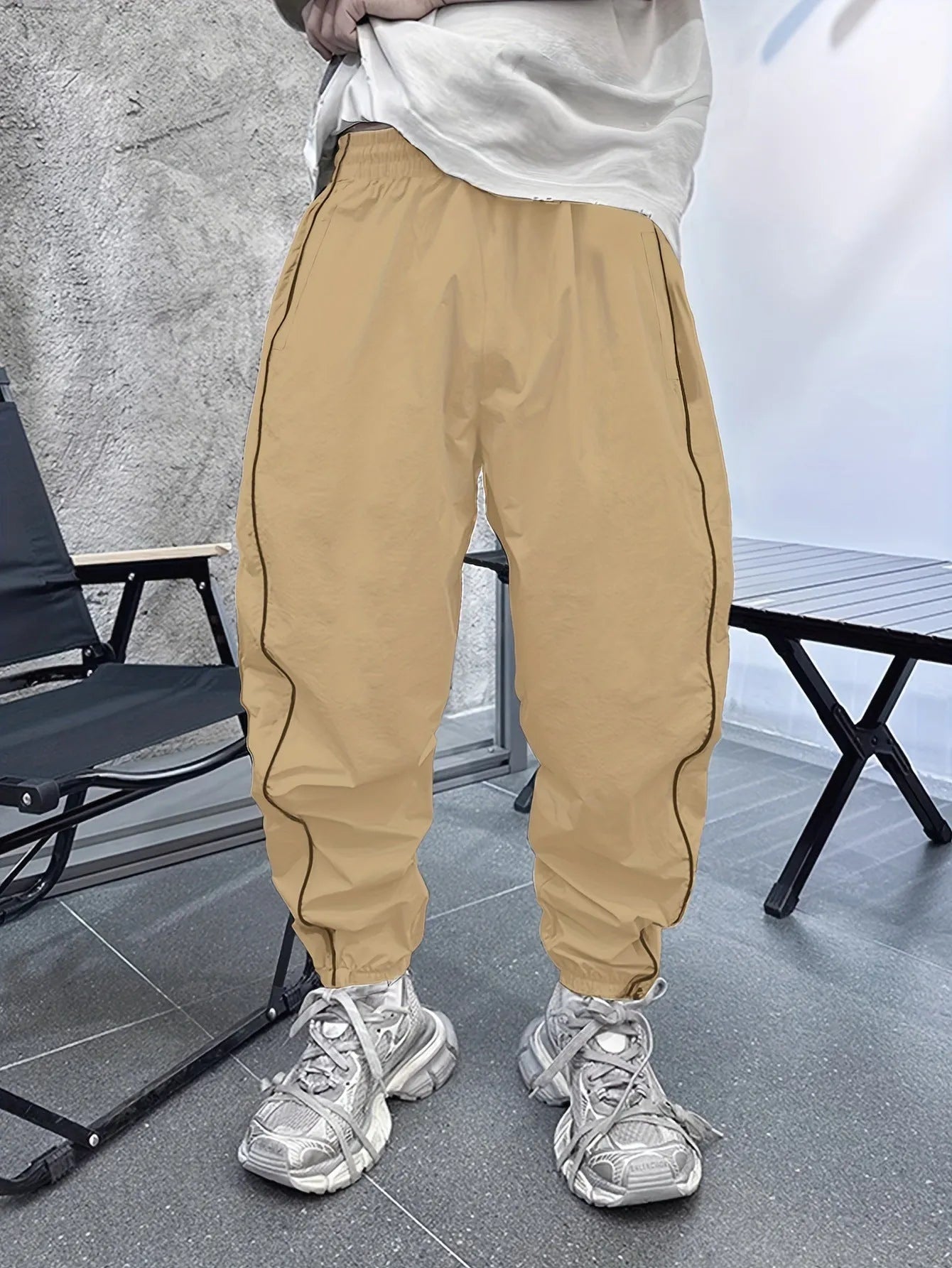 Men's loose fit bamboo fibre cropped sports trousers in Army Green colour.