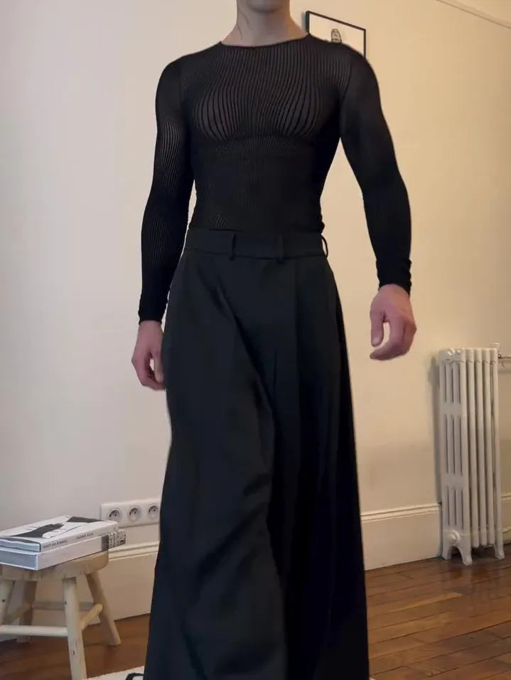 Black mesh long-sleeve top with sheer striped design on a model, regular fit, polyester fabric