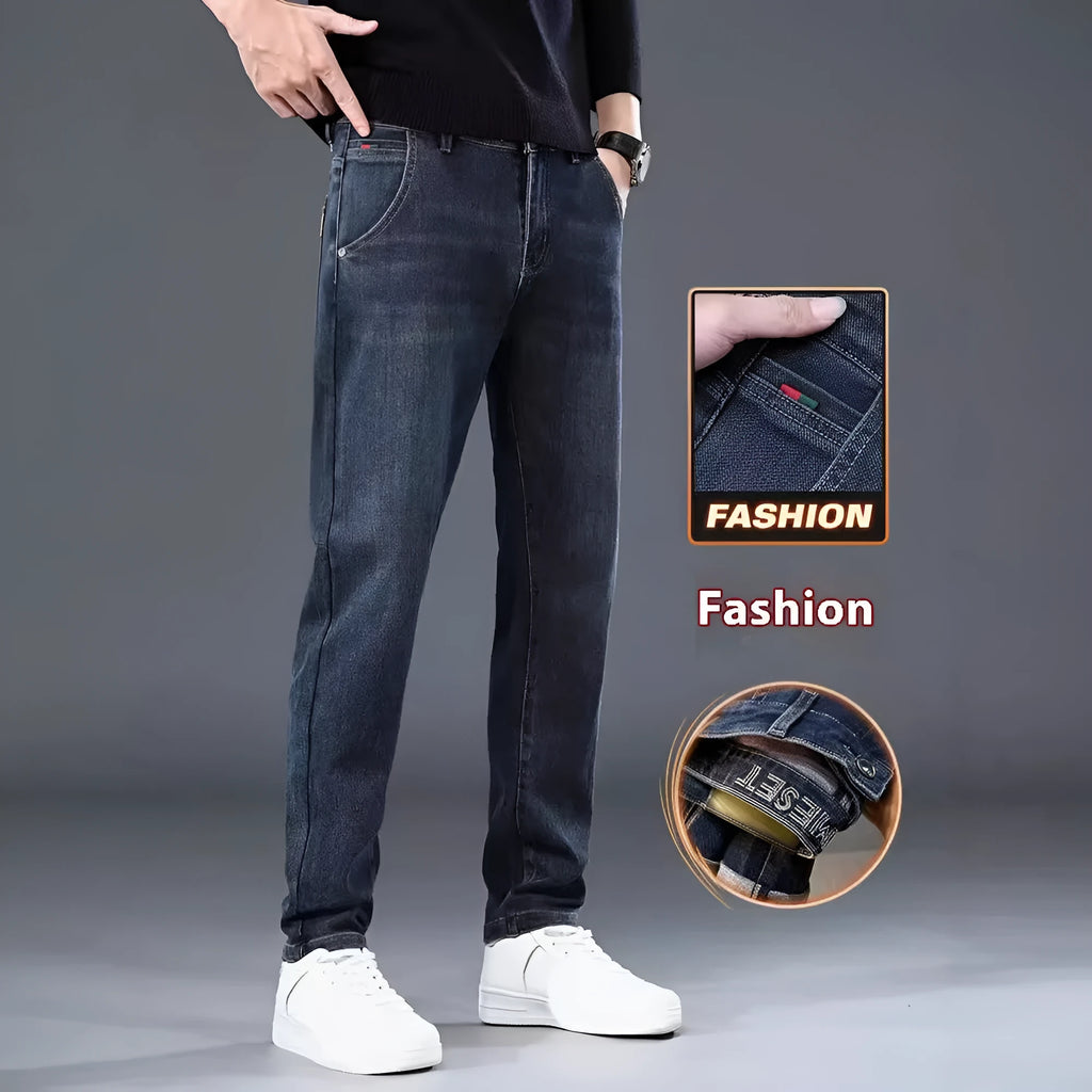 Blue grey slim straight casual trousers with a zipper fly on a mid-waist.
