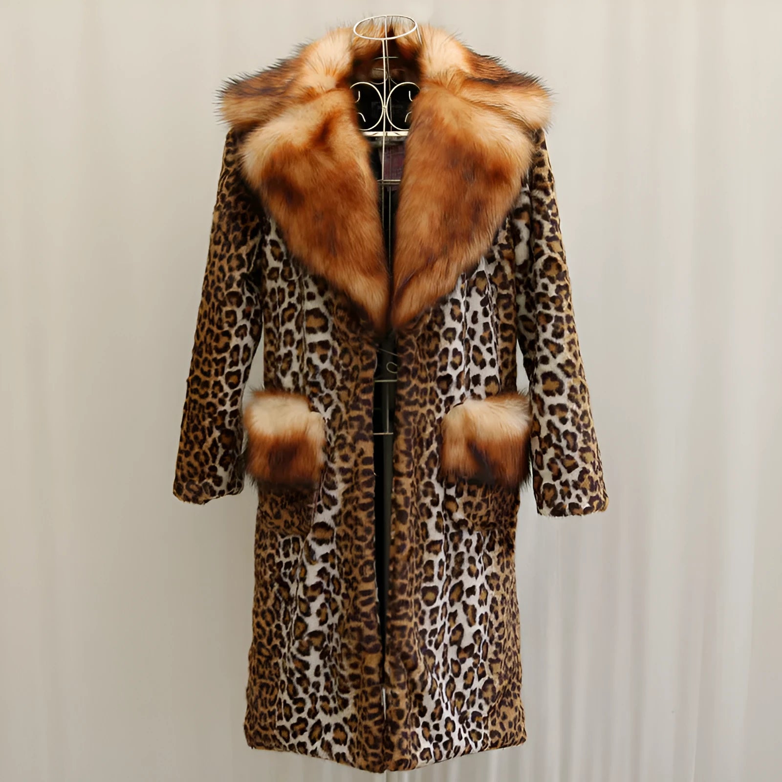 Women's long leopard print artificial fur jacket with regular sleeves on a hanger.