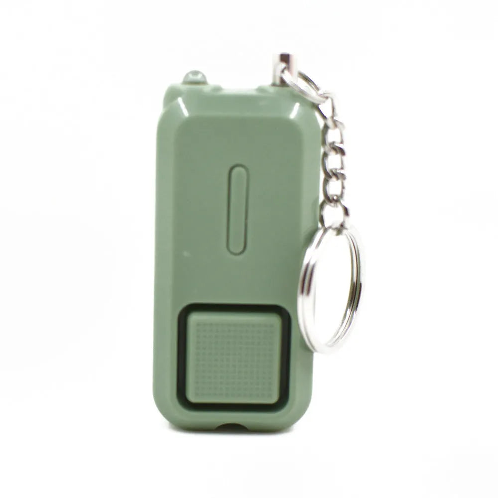 Compact pink personal safety alarm measuring 65mm long with emergency siren function