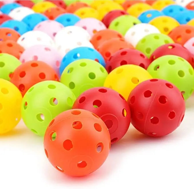 Multi-colour 42mm polyethylene golf practice balls in a net bag.