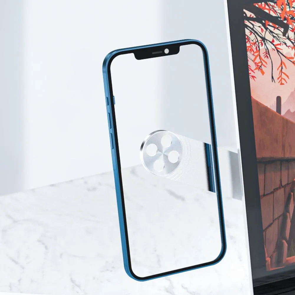 Black aluminium laptop phone holder with magnetic clip attached to a monitor, holding a smartphone