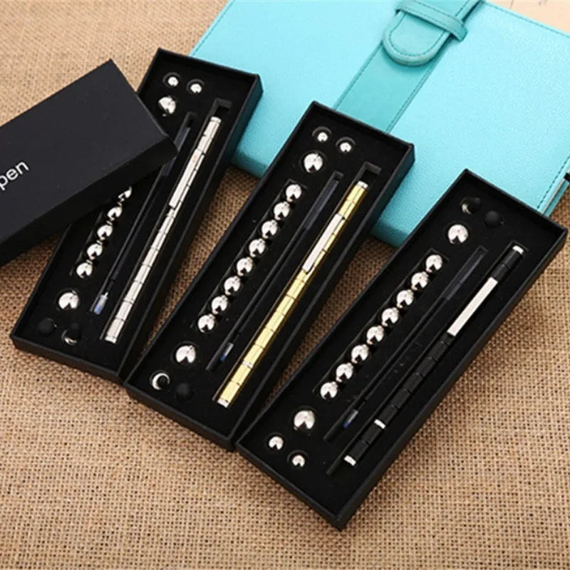 Magnetic modular pen set in silver iron box with 13 rings, 12 balls, 3 refills, 2 capacitor heads, and upgraded magnets