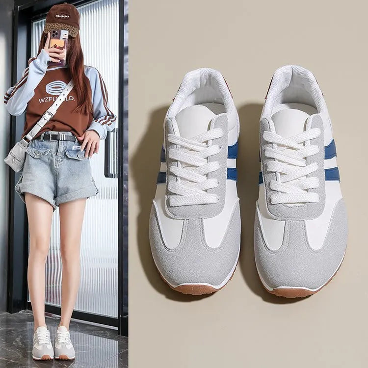 Blue and grey Cortez stripes casual sports shoes with round toe and flat rubber sole.