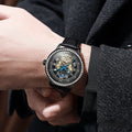 Men's stainless steel waterproof mechanical watch with a round dial and butterfly clasp on a coloured strap.