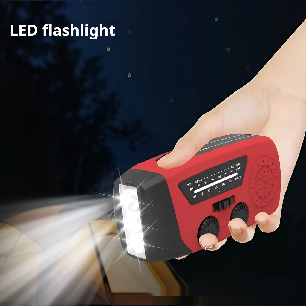 Red rechargeable emergency hand-crank radio torch with 5W LED light and wrist strap