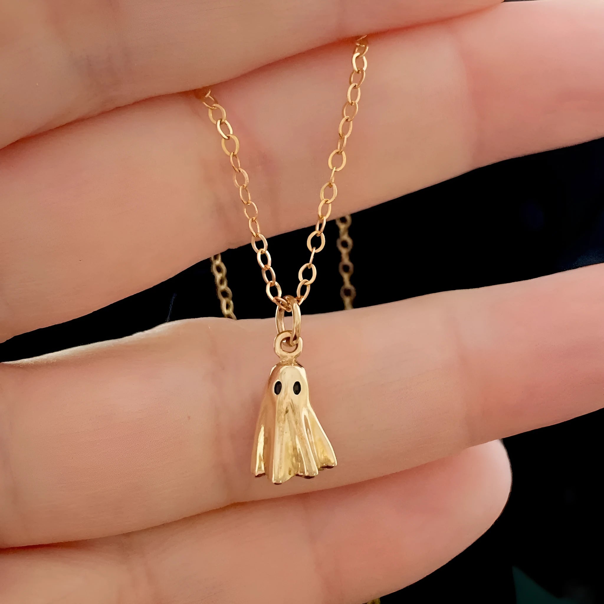 Stainless steel ghost pendant necklace with titanium steel detailing and twisted chain