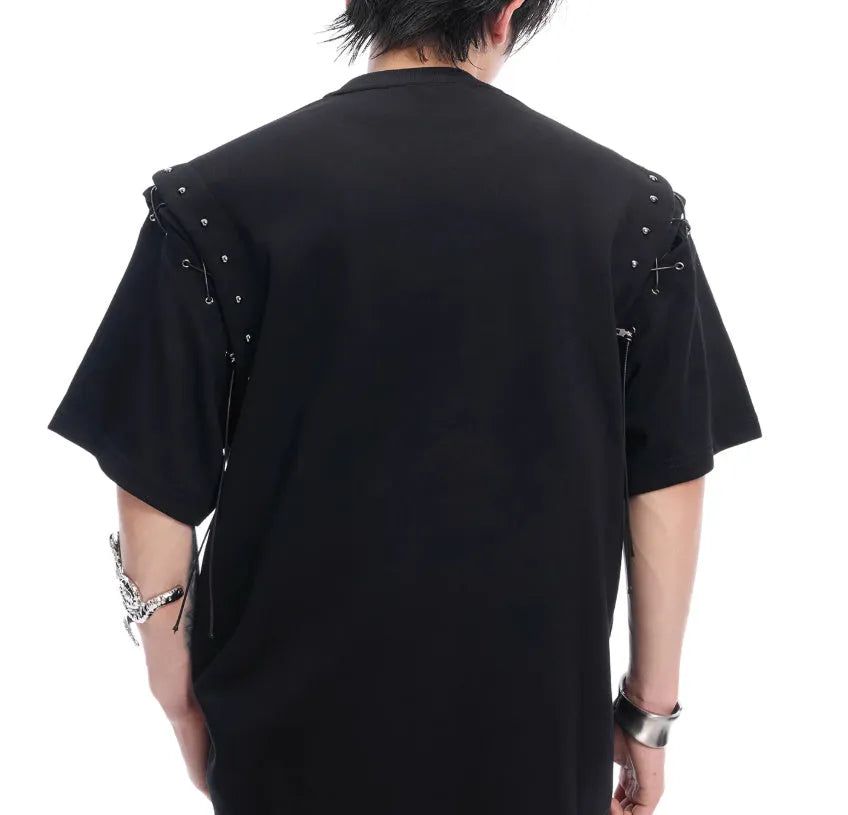 Women's black short sleeve t-shirt with white lace-up cutout detail on front.