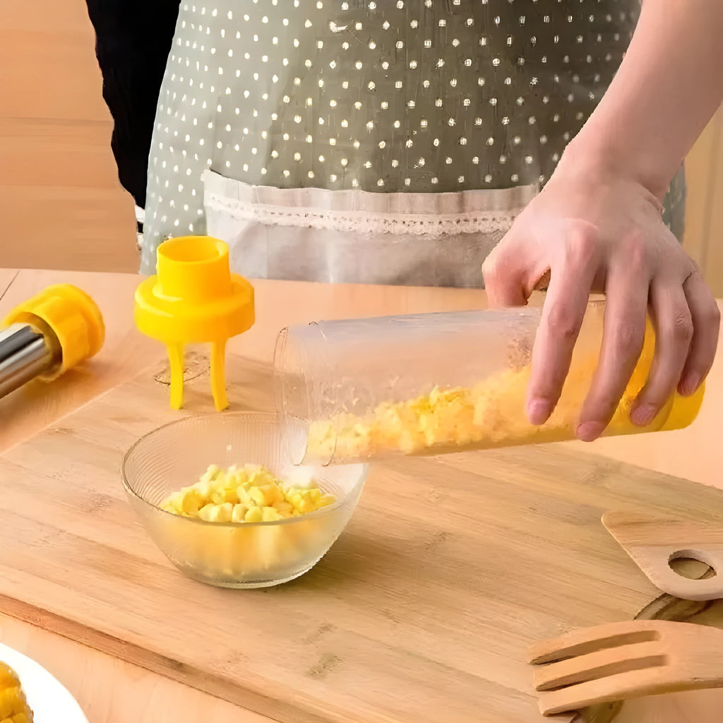 Yellow cylindrical corn stripper kitchen tool with stainless steel blades for removing kernels