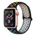 Silicone sports wristband with buckle strap in black, rainbow, or white colours.