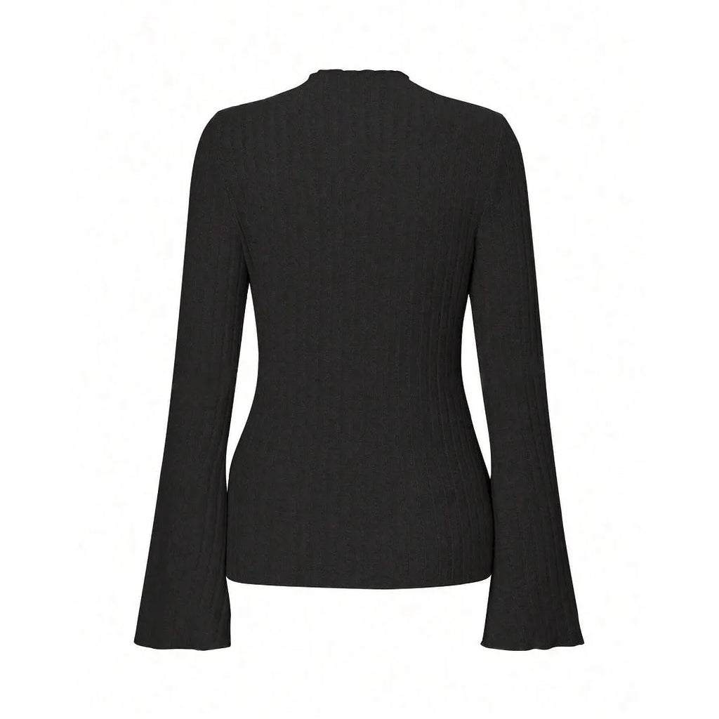 Slim-fit long-sleeve top in black with sunken stripe texture and lantern sleeves on a hanger.
