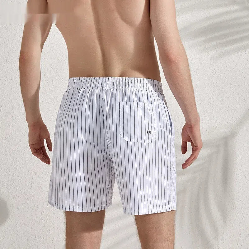 Men's quick-drying beach pants with white stripes, loose plus size, built-in lining, side view