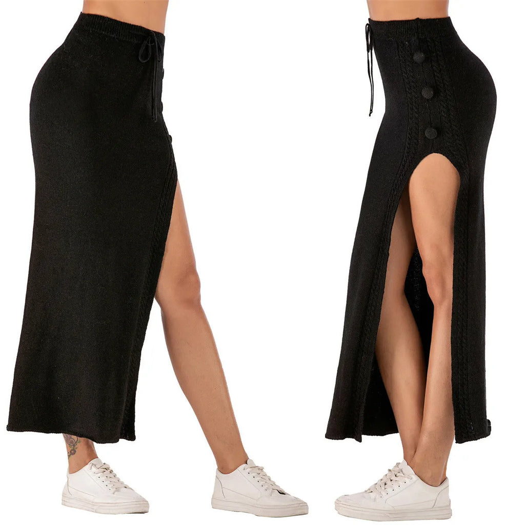 Black slim-fit midi skirt with a side split and strap details on a mannequin.