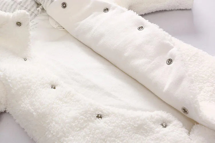 Cotton baby jumpsuit romper in marrón, pink, or white colours with long sleeves and footed/footless options