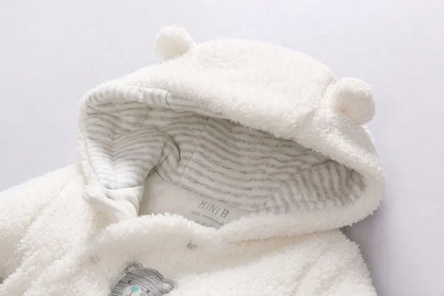 Cotton baby jumpsuit romper in marrón, pink, or white colours with long sleeves and footed/footless options