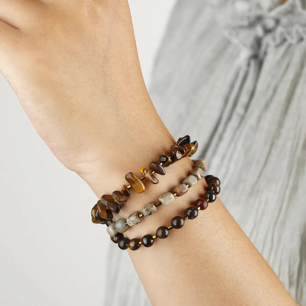 Tigereye stone geometric ball bracelet with bronze setting in brown colour