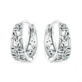 Retro hollow butterfly zircon earrings in sterling silver measuring 14mm by 5mm