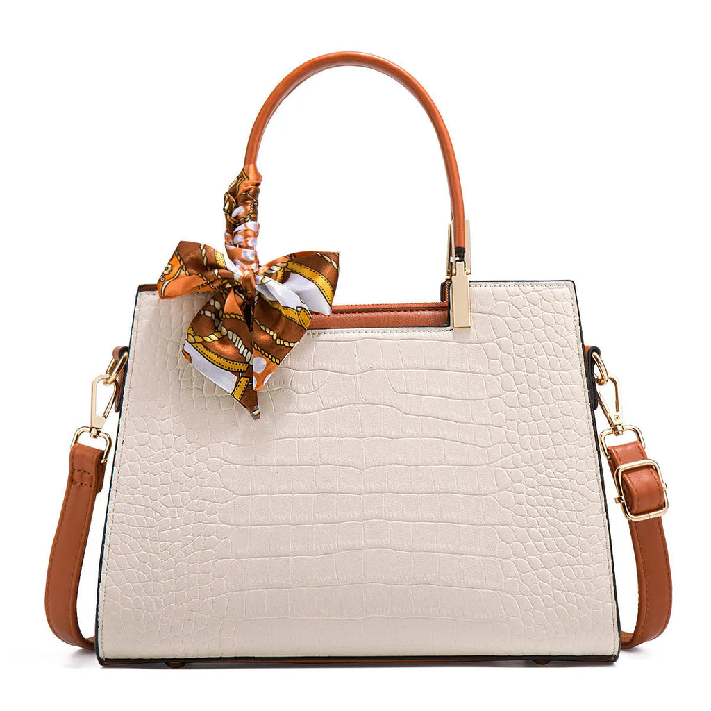 Milky white women's large-capacity PU shoulder handbag with sewing lines and multiple compartments.