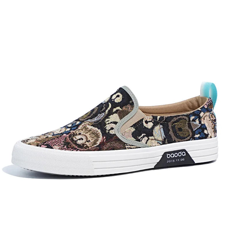 Khaki canvas slip-on sneakers with vulcanised rubber sole and mesh lining on a white background.