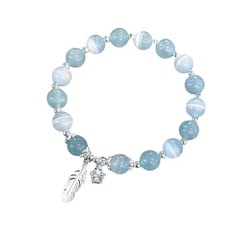 Korean style glass crystal bracelet with feather XingX blue moonlight colour and eight Awn star design