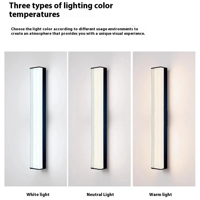 Modern outdoor wall lamp mounted on an exterior wall, showcasing its simple design.