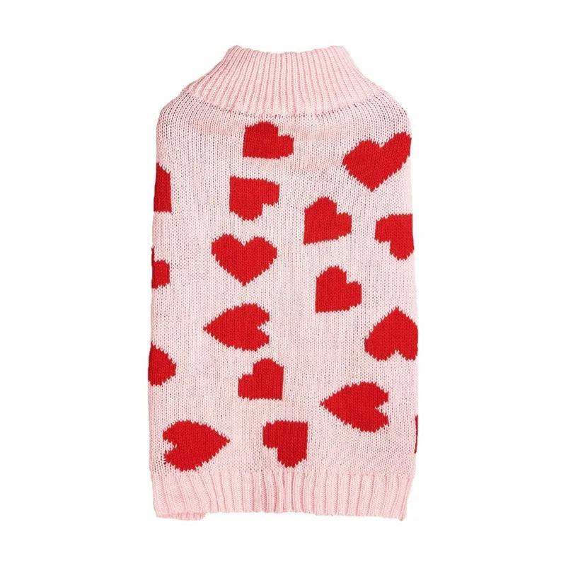 Red love heart design dog sweater on small dog showing acrylic knit and decorative motifs
