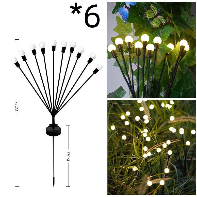 Solar-powered LED garden light with multiple heads on stainless steel ground spikes