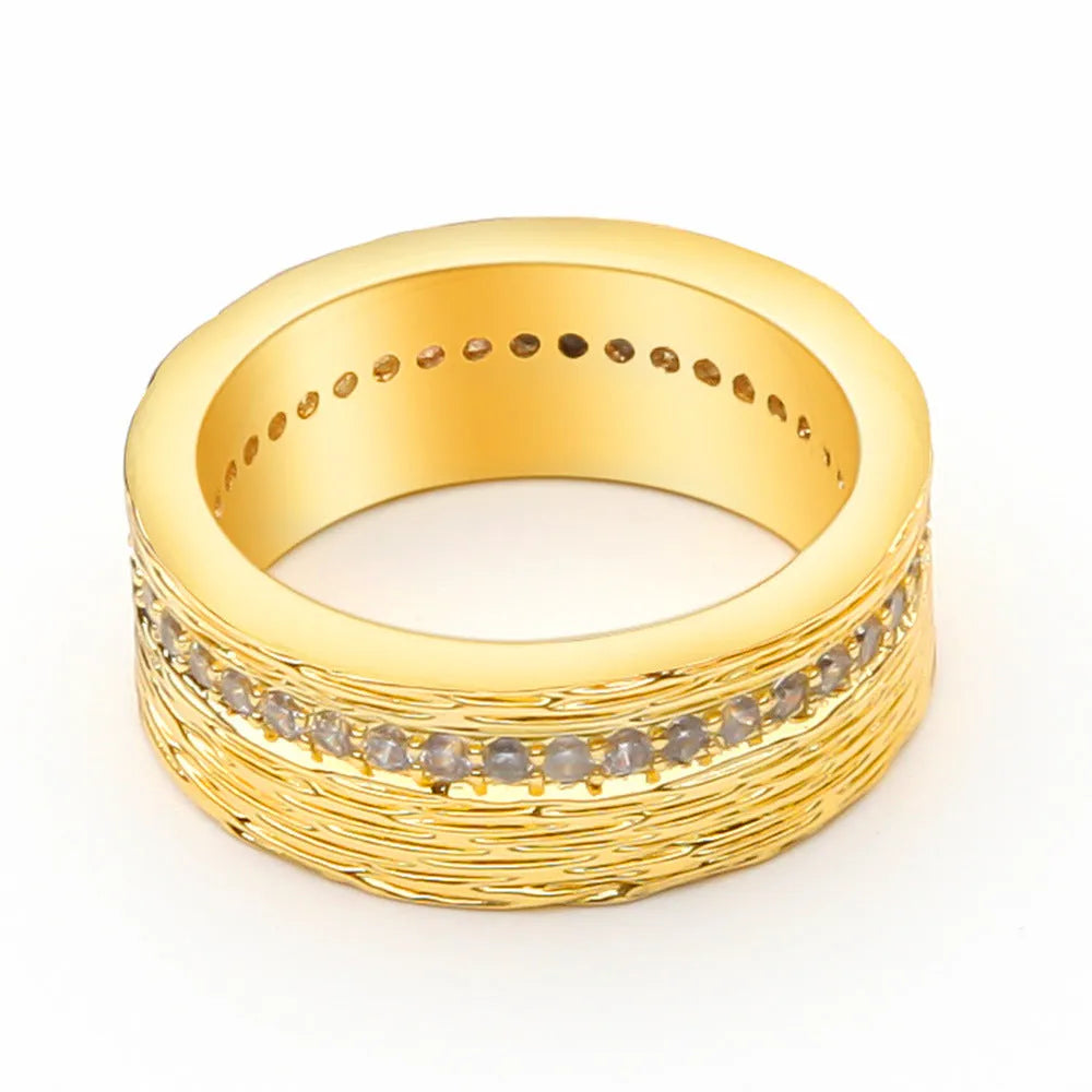 Gold geometric women's zircon ring on a copper base, shown in size 7