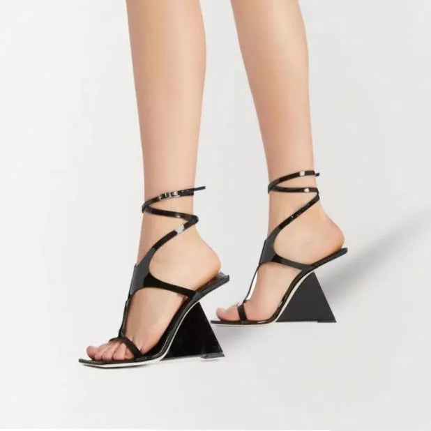 Women's black square toe high heel sandals with a buckle fastening and 9.5cm heel