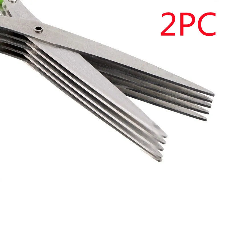 Stainless steel multi-layer herb scissors with green handles for chopping green onions and seaweed.