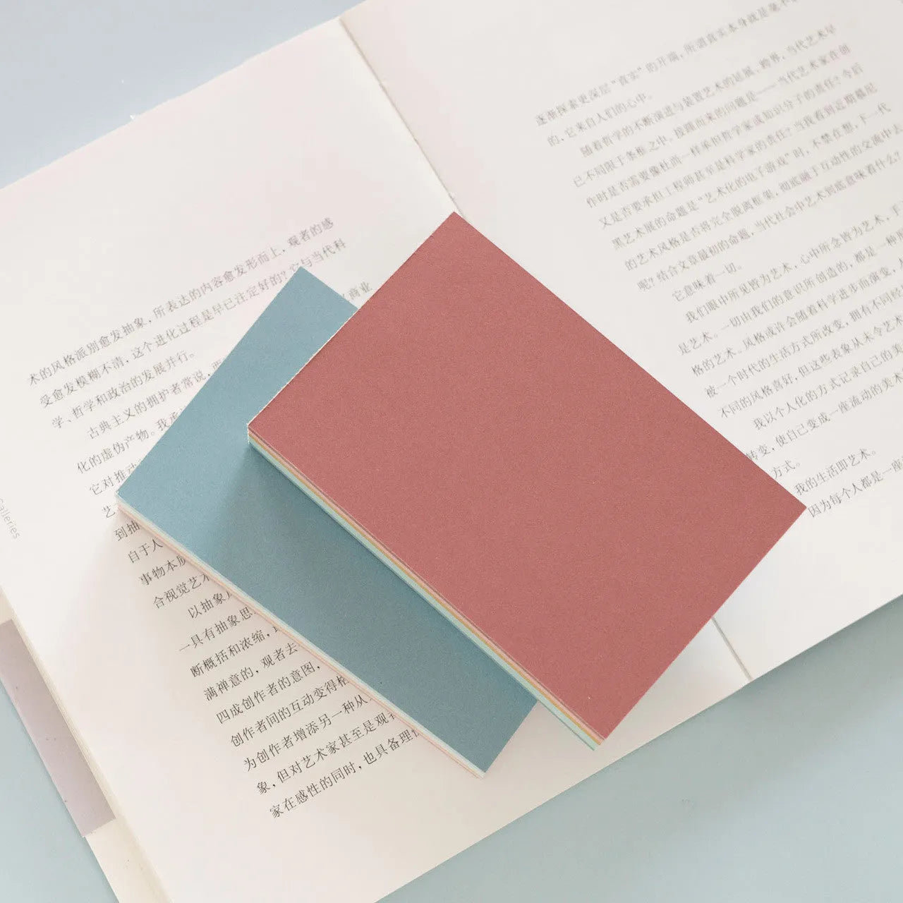 Large self-adhesive sticky notes in six colours measuring 12cm by 8cm, pack of 150 sheets for organisation