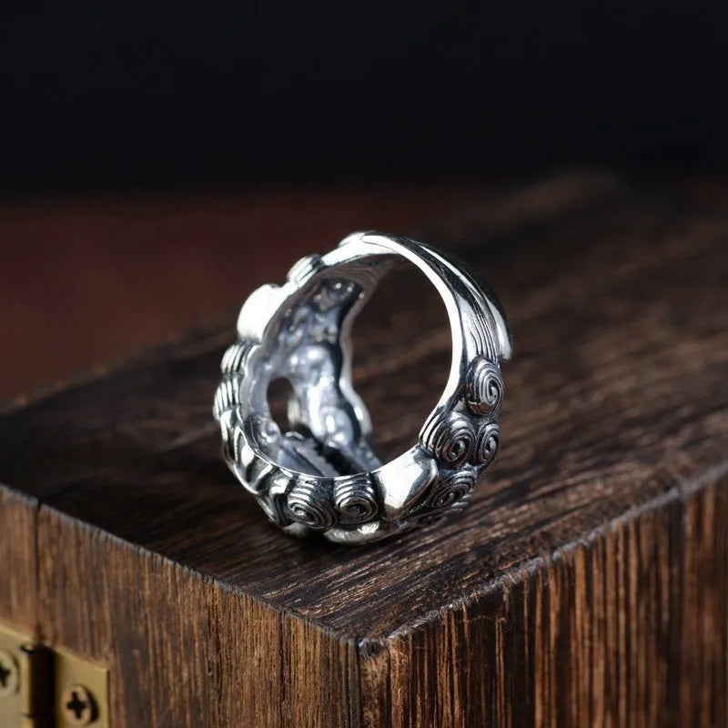 Silver open ring with Jibeast pattern detailing and retro styling