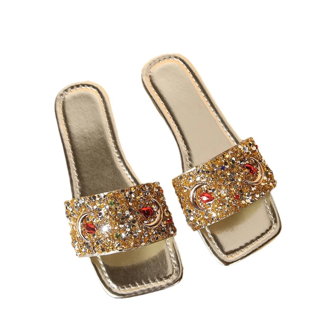 Gold women's slippers with rhinestone sequin detailing on flat rubber soles