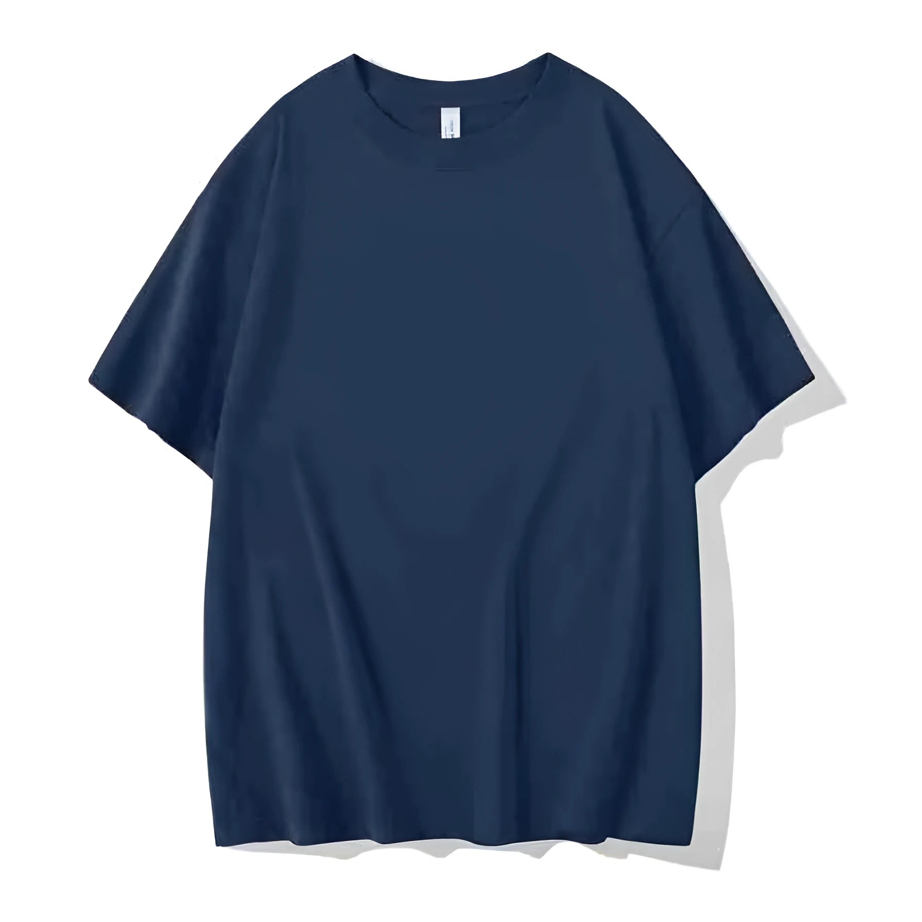 Man wearing a heavyweight dark grey drop shoulder T-shirt with layered shoulder detail.