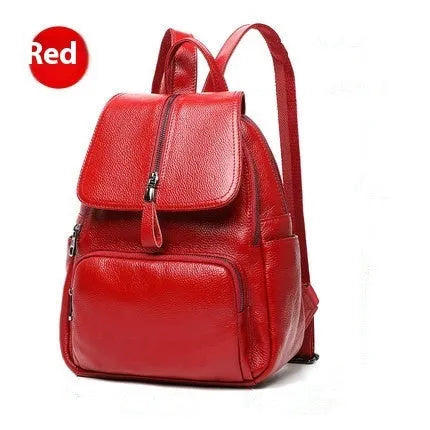 Blue genuine leather women's backpack with street style design showing internal organiser compartments