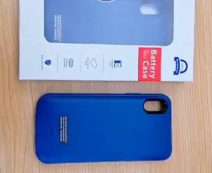 Black silicone iPhone battery charger case showing Lightning port and soft shell construction