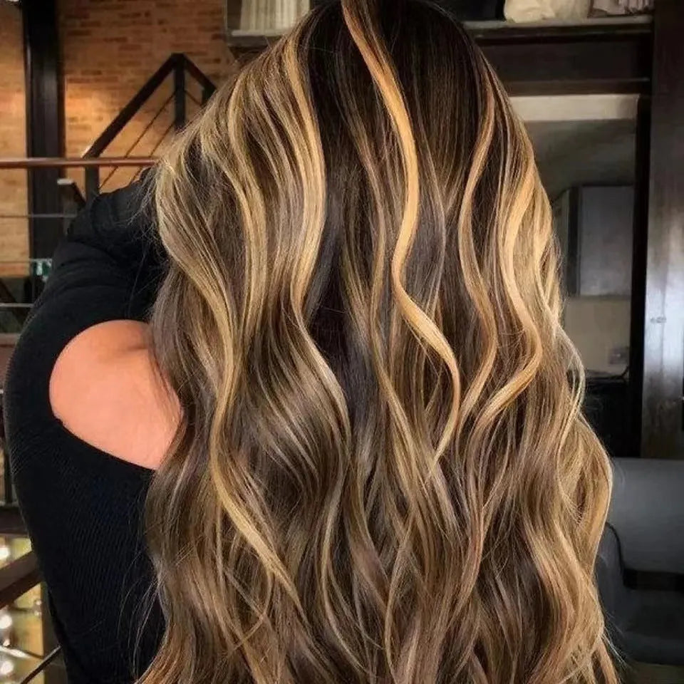 Front lace synthetic wig with long black gradient curly hair in a big wave style.