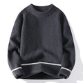 Grey loose fit men's round neck pullover sweater with long sleeves on a hanger.