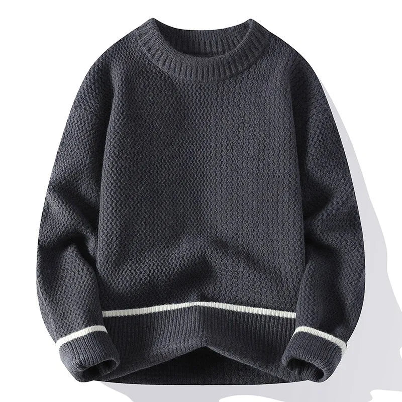 Grey loose fit men's round neck pullover sweater with long sleeves on a hanger.