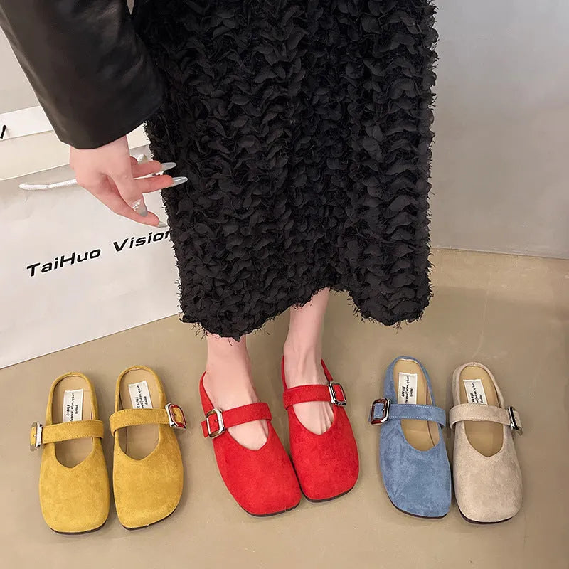 Women's flat closed-toe half slipper in a choice of colours, showing square toe and rubber sole.