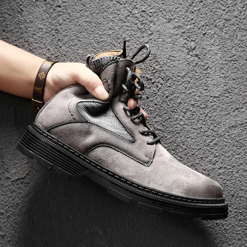 Men's vintage Martin boots in black with a round toe, low thick heel, and rubber sole.