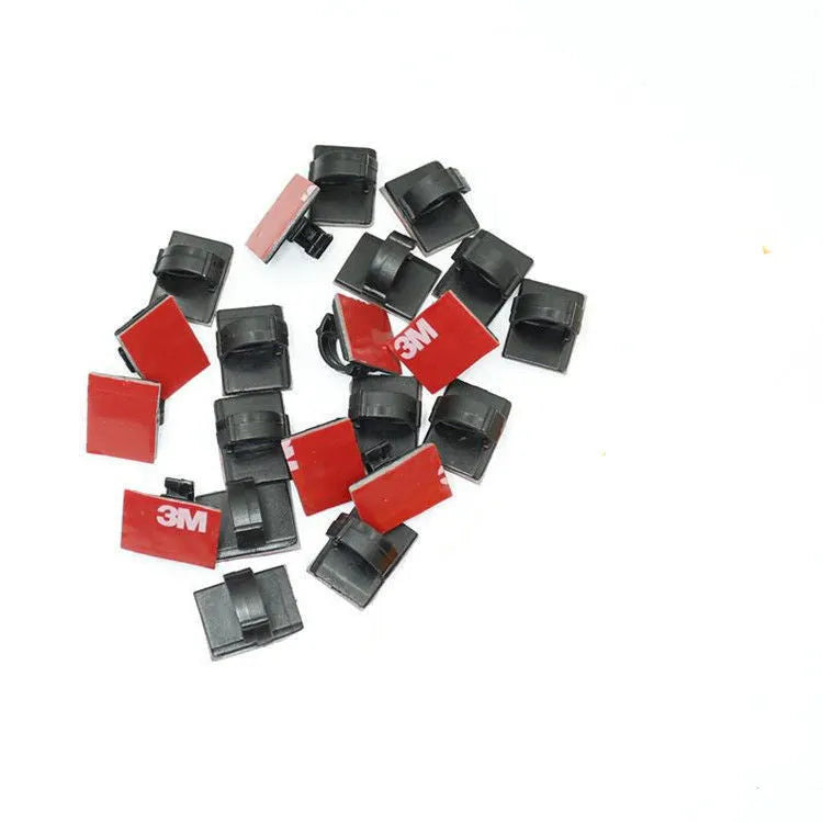 Black and white self-adhesive plastic buckles for organising flat car wiring cables
