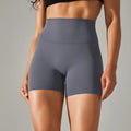 Women's high waist hip lift fitness pants in dark green with moisture-wicking fabric for sports activities