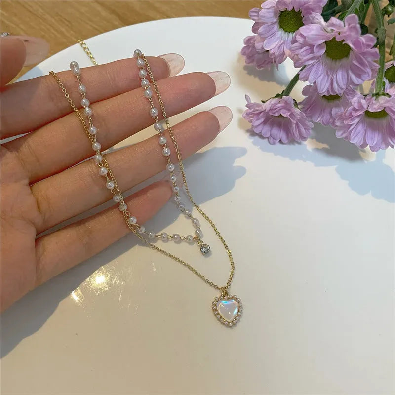 Gold electroplated heart-shaped double-layer necklace on woman, zinc alloy, adjustable 21-50 cm circumference