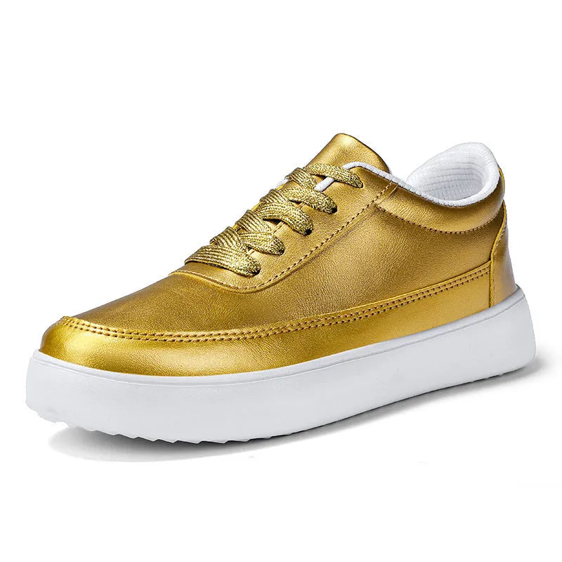 Women's white leather lace-up flat casual shoes on a solid background.