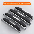 Black plastic silicone car door bumper strips measuring 9.5 by 2 centimetres in a four-piece set