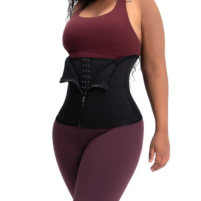 A black neoprene breasted body shaping belly band laid flat, showing its high-waist design.