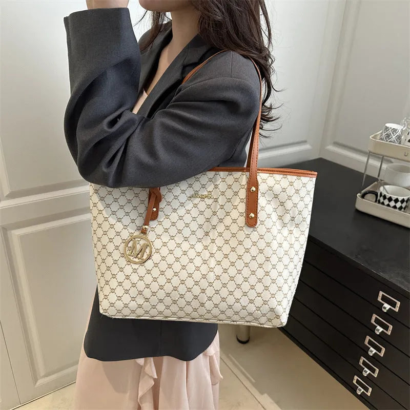 Women's western style PU leather shoulder bag in black showing visible sewing thread details.