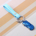 Close-up of a heart-shaped zinc alloy metal keychain pendant on a key ring, showing colour options.